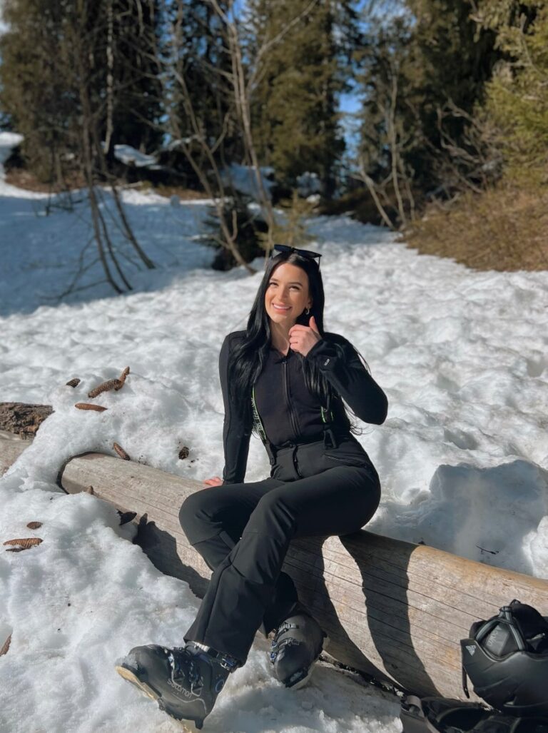 Ski season chalet host skiing in the french alps in moraine, sat in the forest on the ski slope in the snow